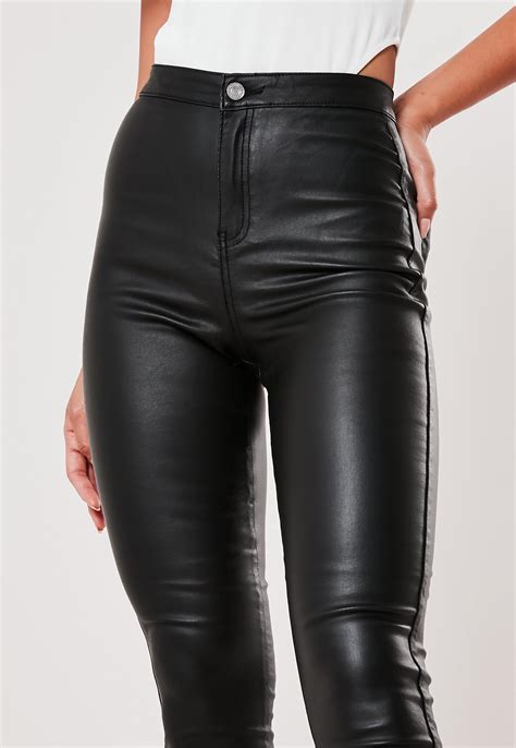 Givenchy: Black Coated Skinny Jeans 